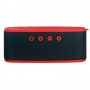 Altavoz Bluetooth rojo con el logotipo de Fly Emirates y cargador inalámbrico para promoción