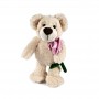 Osito de peluche con flor Disponible en 3 colores